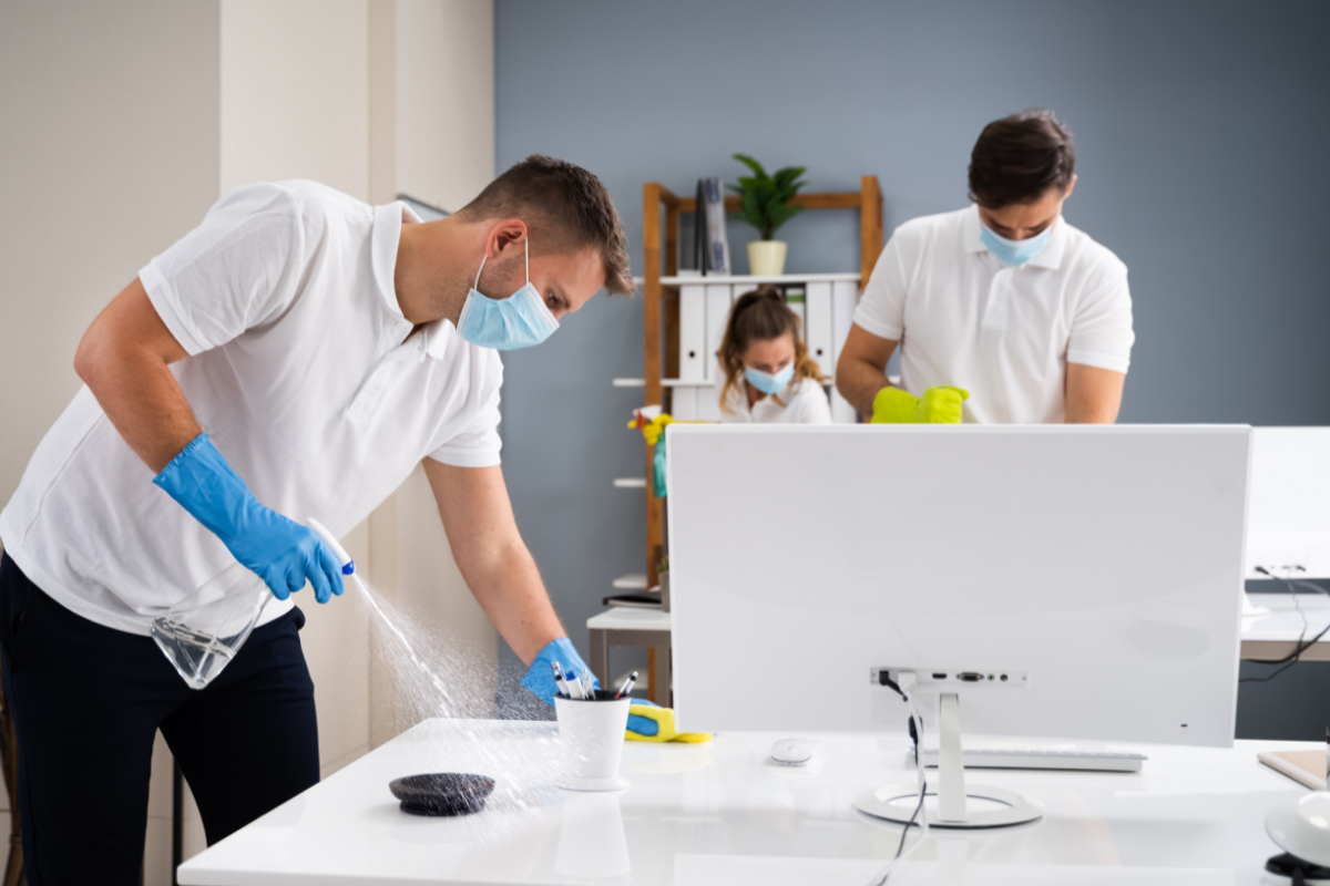 professional cleaners cleaning an office space